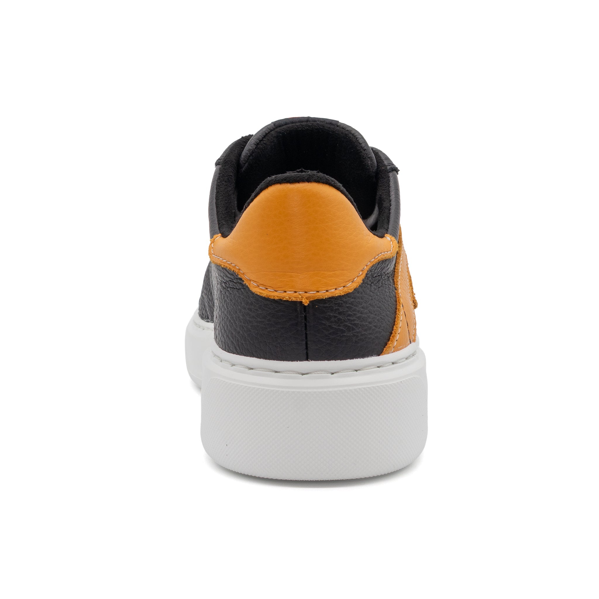 Black and gold two-tone lowtop sneaker by BLKSWN Footwear, showing the back view of the stylish design.