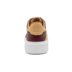 BLKSWN Footwear 601 Two-Tone lowtop sneakers in maroon and old gold, showing the back view with stylish color blocking.
