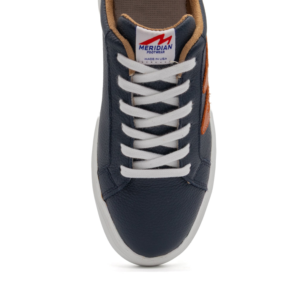 BLKSWN Footwear 601 Two-Tone lowtop sneakers in navy and burnt orange with a stylish two-tone design.