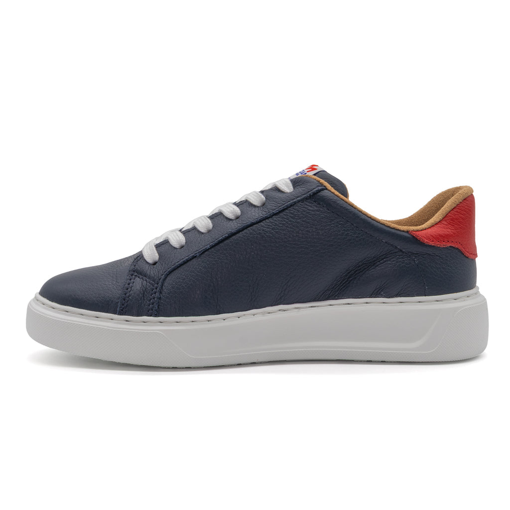 Left shoe of BLKSWN Footwear 601 Two-Tone lowtop sneaker in navy and red berry with a stylish two-tone design.