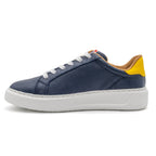 Left view of BLKSWN Footwear 601 Two-Tone lowtop sneakers in navy and yellow, showcasing their stylish two-tone design.