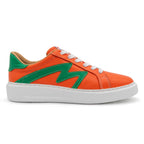 Right foot of BLKSWN Footwear 601 Two-Tone lowtop sneaker in vibrant orange and green color blocking.