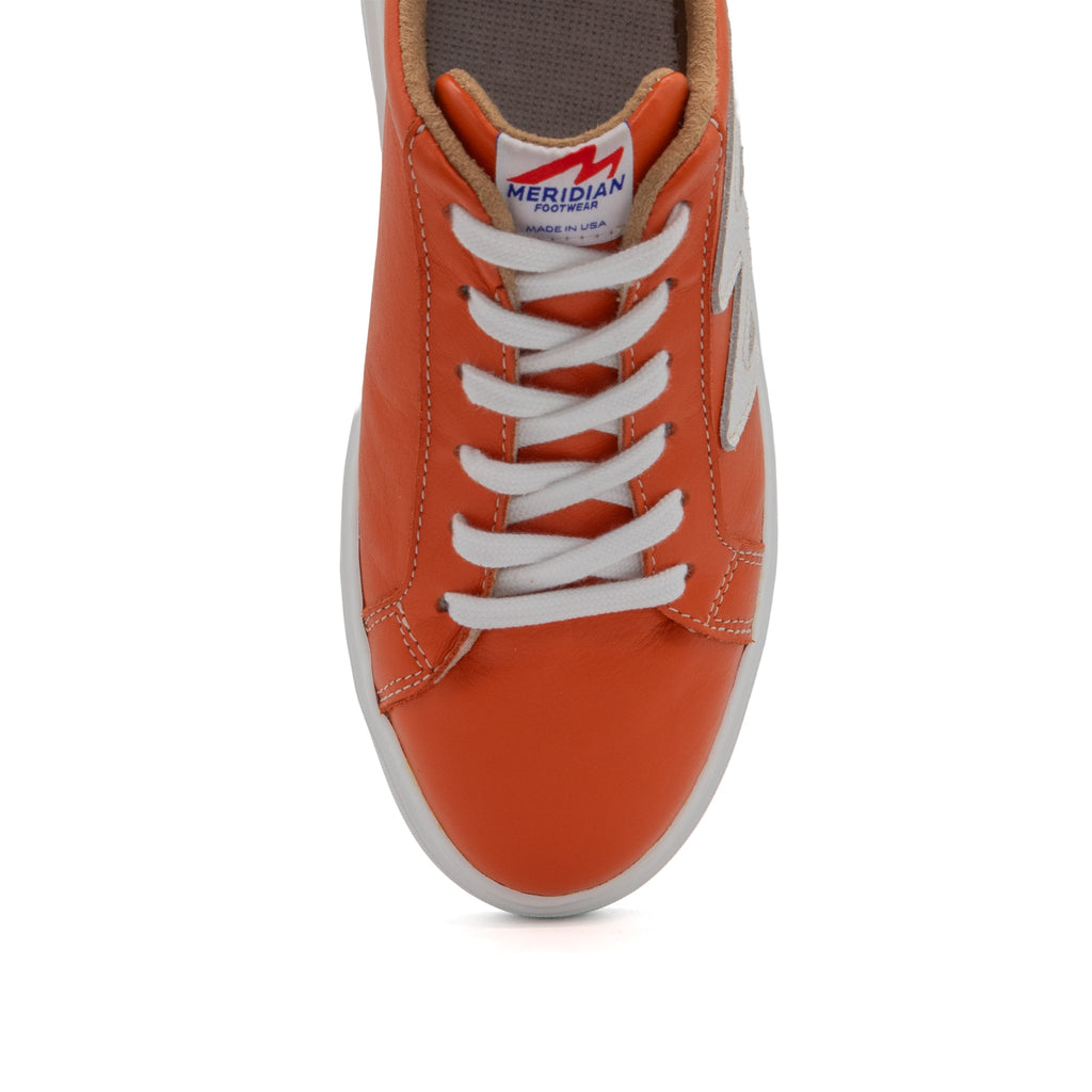 BLKSWN Footwear 601 Two-Tone lowtop sneakers in orange and white with a sleek design and comfortable fit.