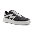 Black and white two-tone lowtop sneakers by BLKSWN Footwear, angled view showcasing stylish casual footwear design.