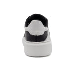 Black and white two-tone lowtop sneakers by BLKSWN Footwear shown from the back view.