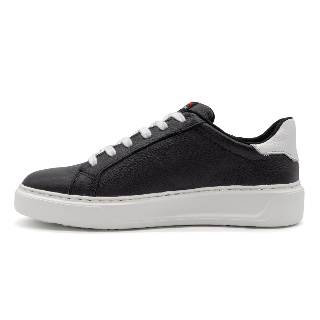 Black and white two-tone lowtop sneakers from BLKSWN Footwear, showcasing stylish design and contrasting color details.