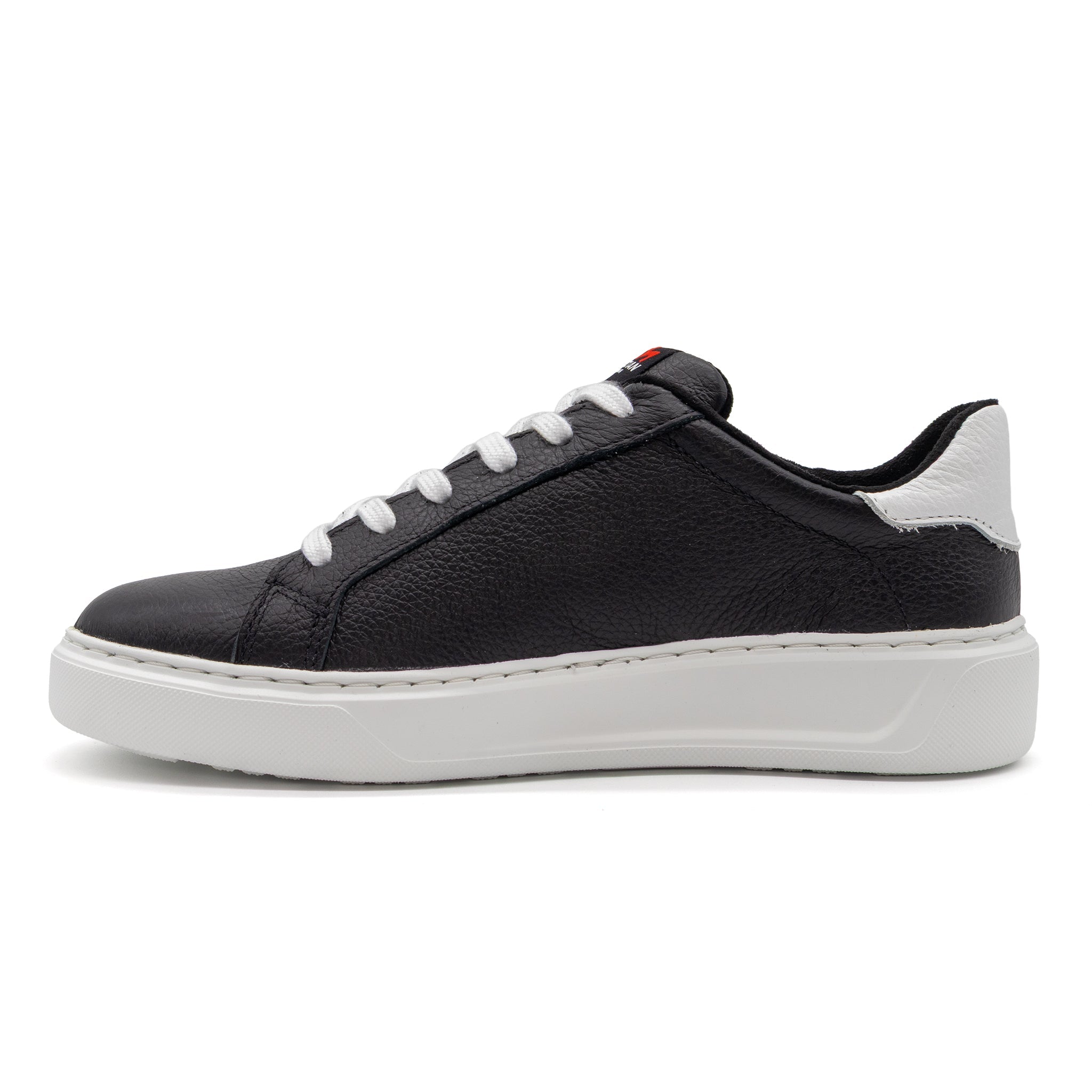 Black and white two-tone lowtop sneakers from BLKSWN Footwear, showcasing stylish design and contrasting color details.