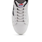 Black and white two-tone lowtop sneakers by BLKSWN Footwear with sleek design and contrasting color accents.