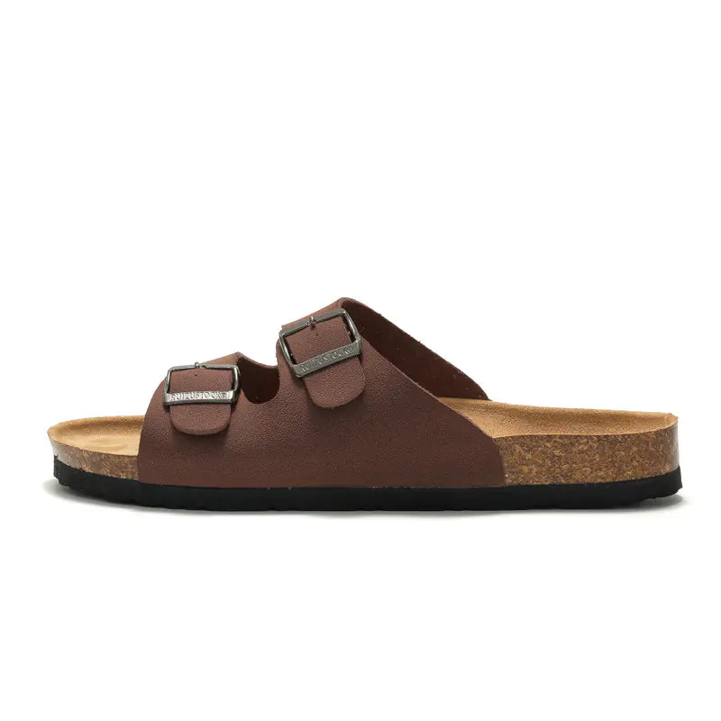 Pair of men's cork slide sandals from Trendy Attic Store01 with open toes and adjustable straps, perfect for casual summer wear.