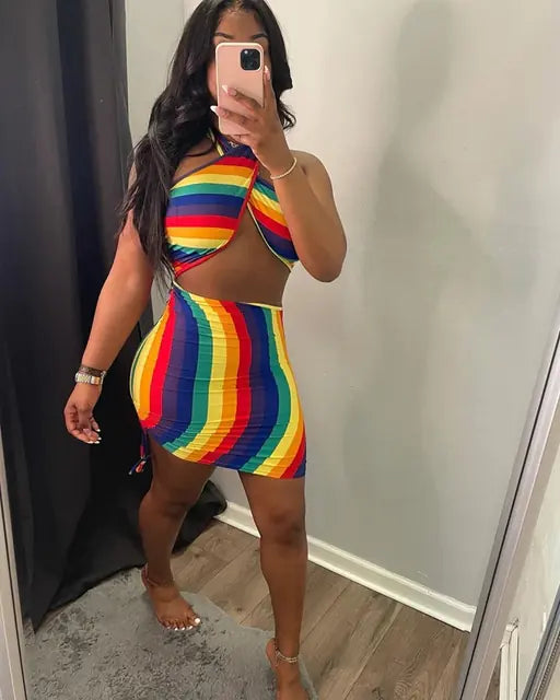 Colorful rainbow tie dye halter bodycon mini dress for women, showcasing vibrant patterns and fitted style.