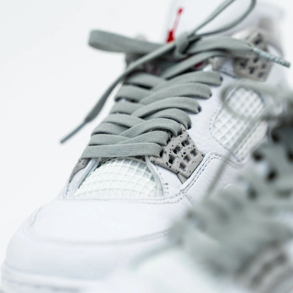 Gray elastic shoelace from Plush Fashion Hub, showing flexible, stretchy material suitable for comfortable, easy-to-wear shoes.