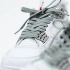 Gray elastic shoelace from Plush Fashion Hub, showing flexible, stretchy material suitable for comfortable, easy-to-wear shoes.