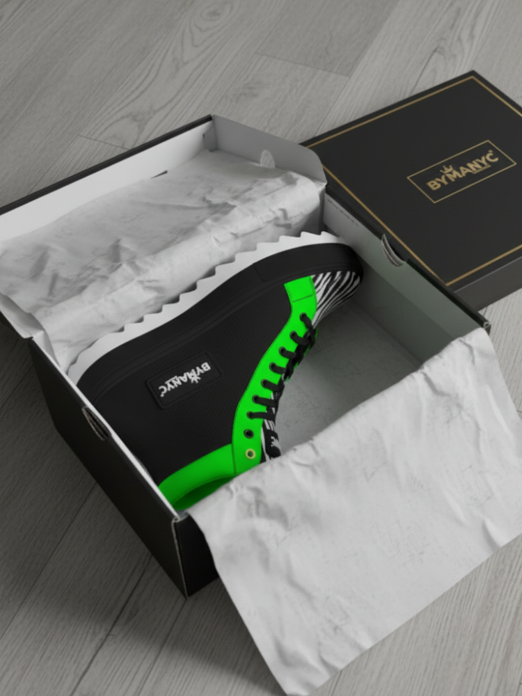 Black high-top boot with neon green trim and zebra-print toe, nestled in a branded box.
