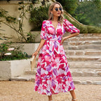Women’s summer floral V-neck dress by Dukun Design featuring a breezy, lightweight fabric and vibrant floral pattern.
