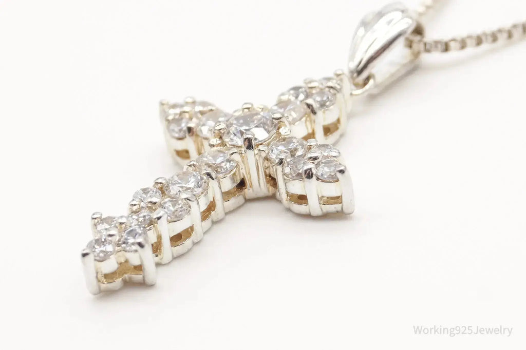 Vintage cubic zirconia cross pendant necklace in sterling silver, designed by Plush Fashion Hub, showcasing elegant jewelry craftsmanship.
