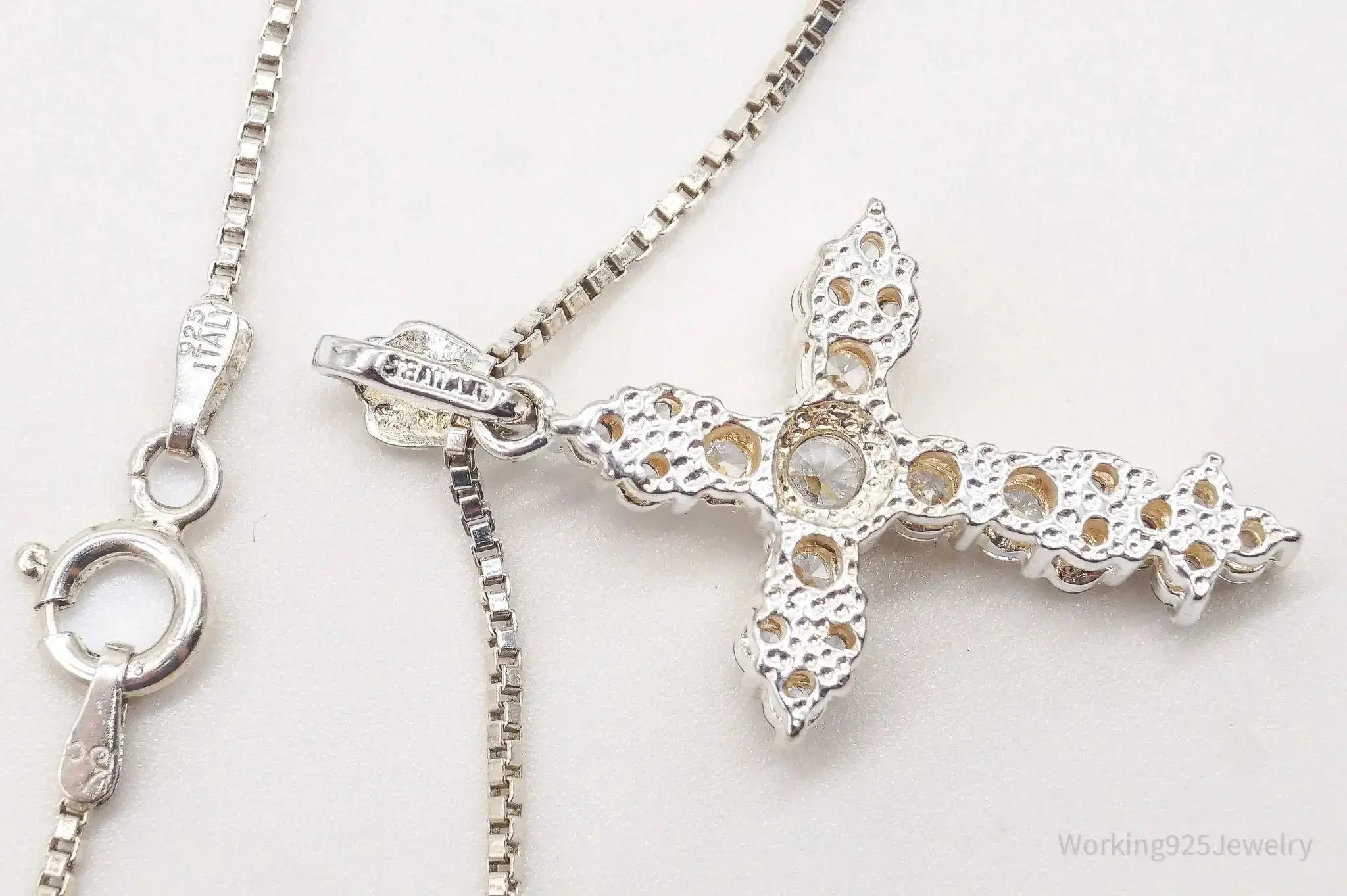Vintage cubic zirconia cross pendant necklace in sterling silver, stylish jewelry piece from Plush Fashion Hub.