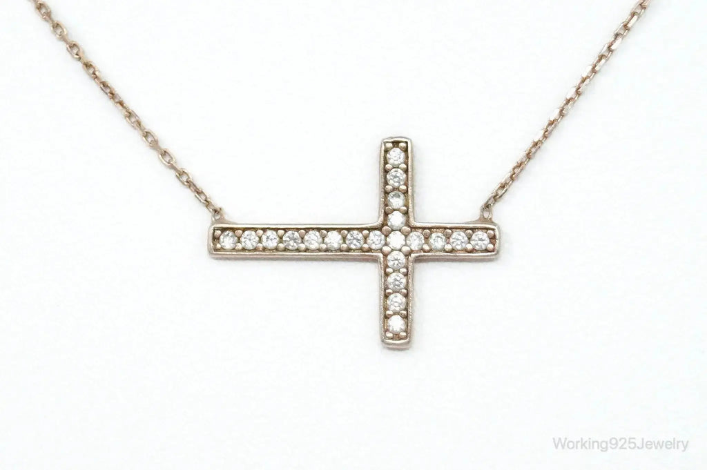 Vintage cubic zirconia rose gold vermeil sterling silver cross necklace, detailed pendant with elegant design.
