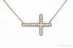 Vintage cubic zirconia rose gold vermeil sterling silver cross necklace, detailed pendant with elegant design.