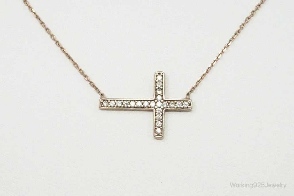 Vintage cubic zirconia rose gold vermeil sterling silver cross necklace, jewelry pendant with sparkling stones and intricate design.
