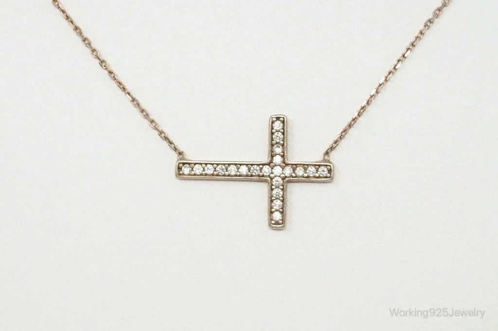 Vintage cubic zirconia rose gold vermeil sterling silver cross necklace, jewelry pendant with intricate design.