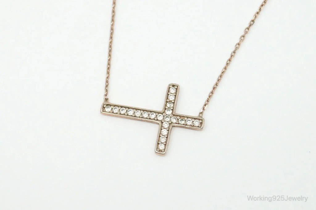 Vintage cubic zirconia rose gold vermeil sterling silver cross necklace with pendant, jewelry accessory featuring elegant design.