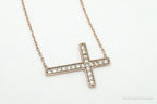 Vintage cubic zirconia rose gold vermeil sterling silver cross necklace, elegant jewelry pendant with sparkling stones.