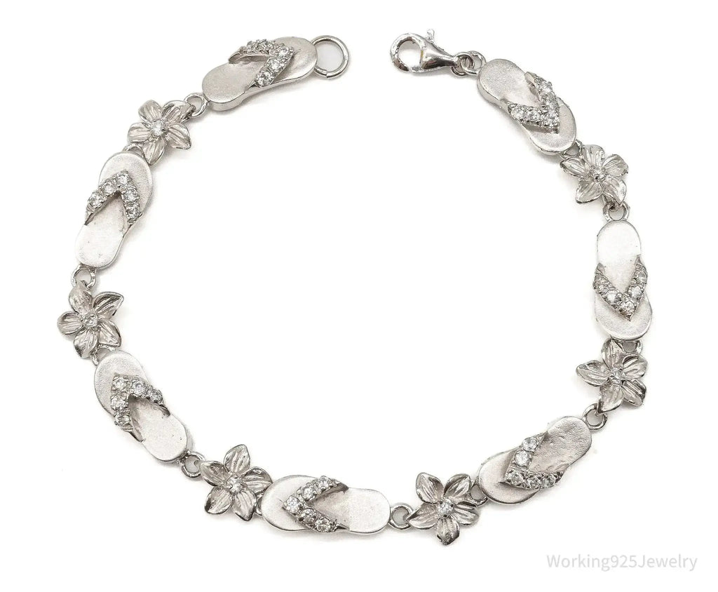Vintage cubic zirconia sandals and flowers sterling silver bracelet with intricate designs, jewelry accessory from Plush Fashion Hub