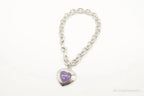 Vintage lavender jade heart charm on silver chain bracelet, sterling silver jewelry with elegant chain links.