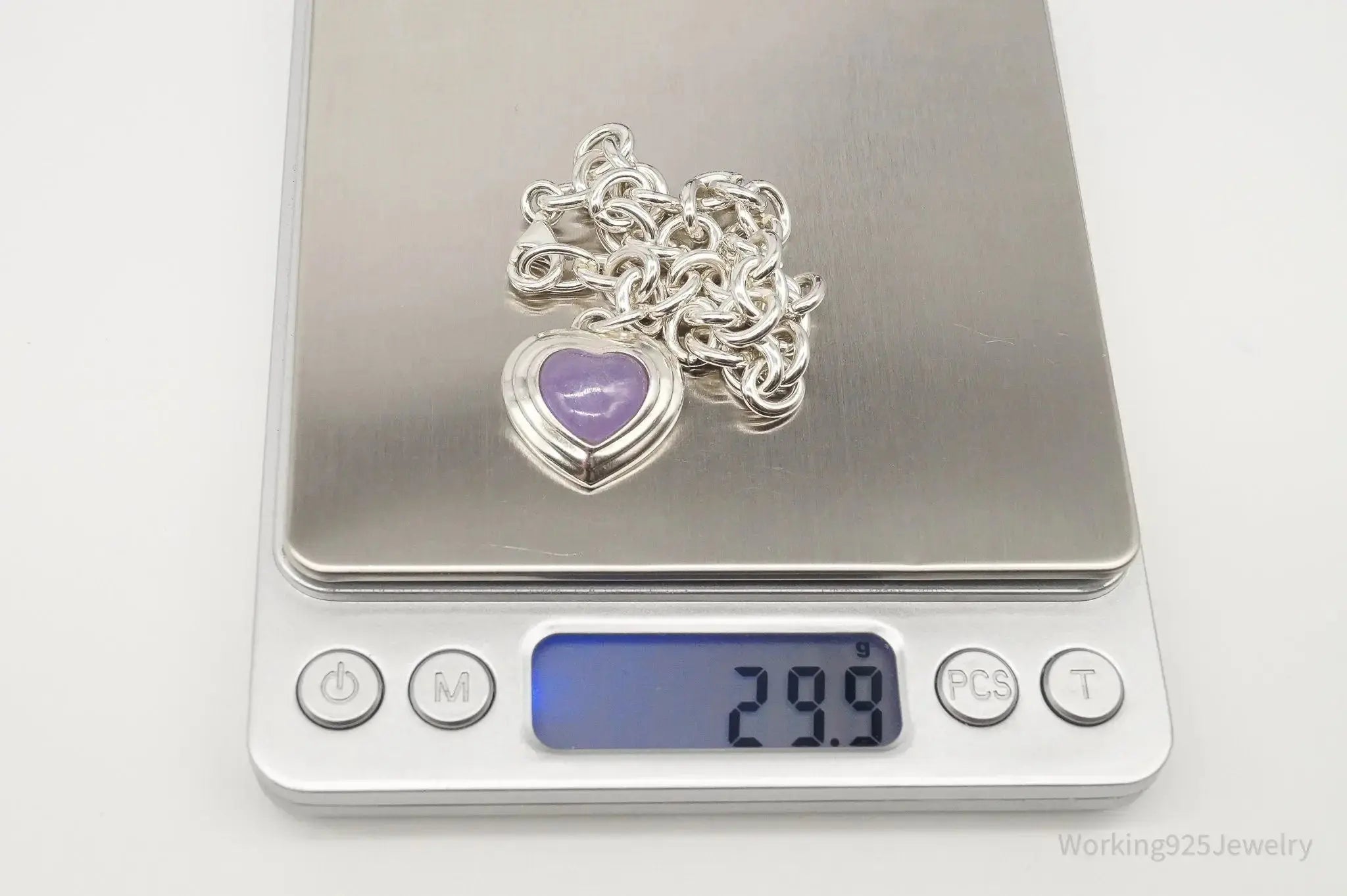Vintage lavender jade heart pendant on sterling silver chain bracelet, designer jewelry with chain link details.