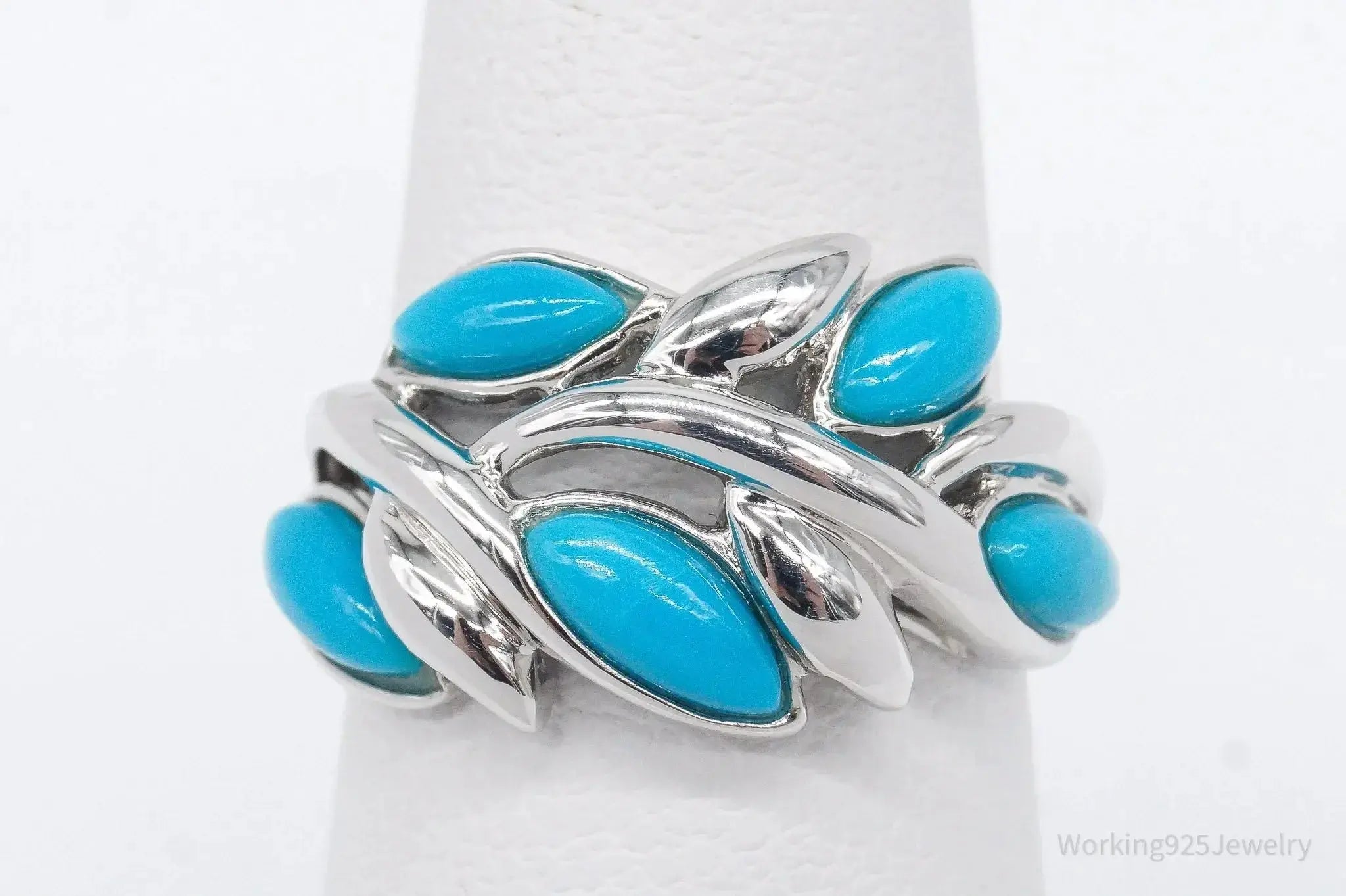Vintage turquoise sterling silver ring in size 5 with intricate design, crafted by Plush Fashion Hub.