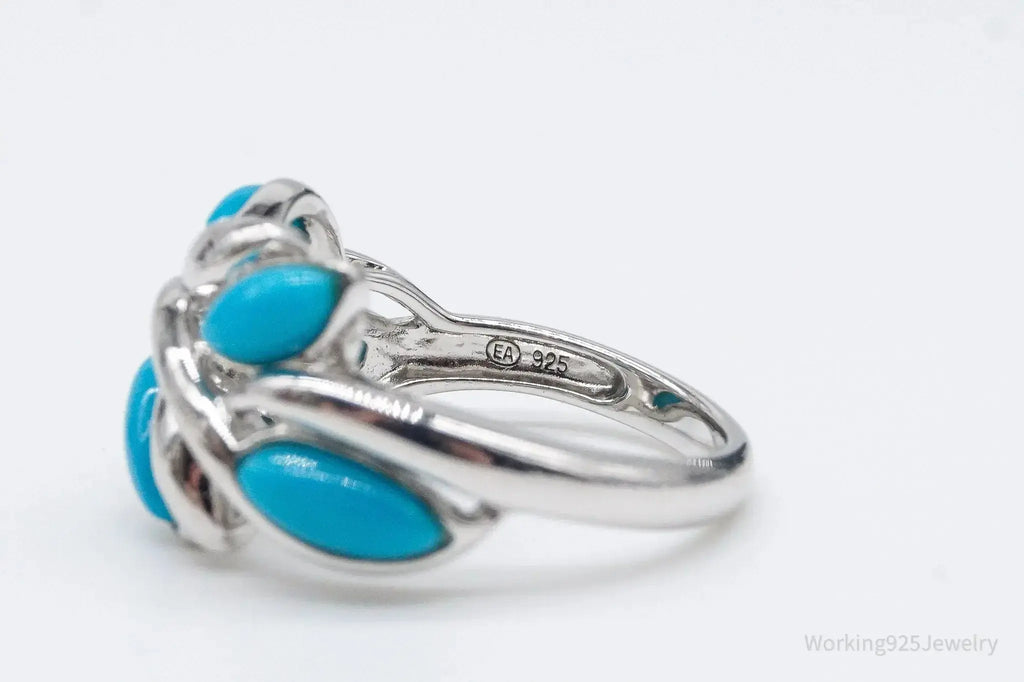 Vintage EA turquoise sterling silver ring in size 5, featuring a detailed design, jewelry by Plush Fashion Hub.