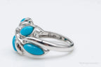 Vintage EA turquoise sterling silver ring in size 5, featuring a detailed design, jewelry by Plush Fashion Hub.