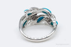 Vintage EA turquoise sterling silver ring in size 5, featuring a detailed design and vibrant turquoise stone, by Plush Fashion Hub.
