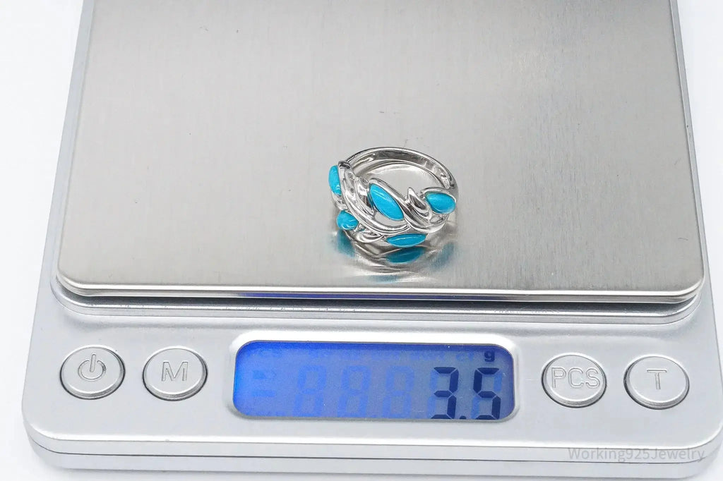 Vintage turquoise sterling silver ring in size 5 with intricate design, crafted by Plush Fashion Hub.