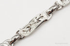 Vintage LaMode sterling silver ID bracelet with engraved name bar, stylish jewelry piece from Plush Fashion Hub.