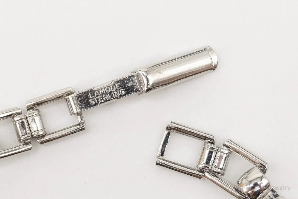 Vintage LaMode sterling silver ID bar bracelet featuring engraved name tag, stylish jewelry piece from Plush Fashion Hub.