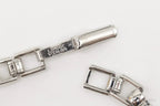 Vintage LaMode sterling silver ID bar bracelet featuring engraved name tag, stylish jewelry piece from Plush Fashion Hub.