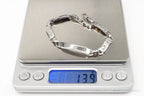 Vintage LaMode sterling silver ID bar bracelet with designer detailing, crafted by Plush Fashion Hub.