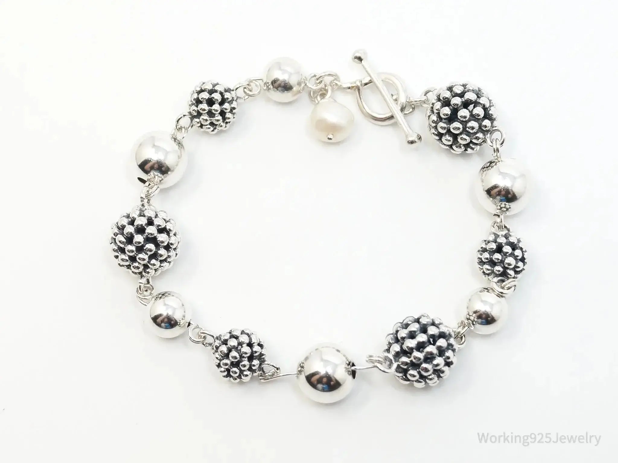 Vintage Michael Dawkins sterling silver bracelet with pearl-spotted ball design, stylish jewelry accessory