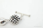 Vintage Michael Dawkins sterling silver bracelet with pearl-spotted ball design, jewelry accessory featuring elegant craftsmanship.