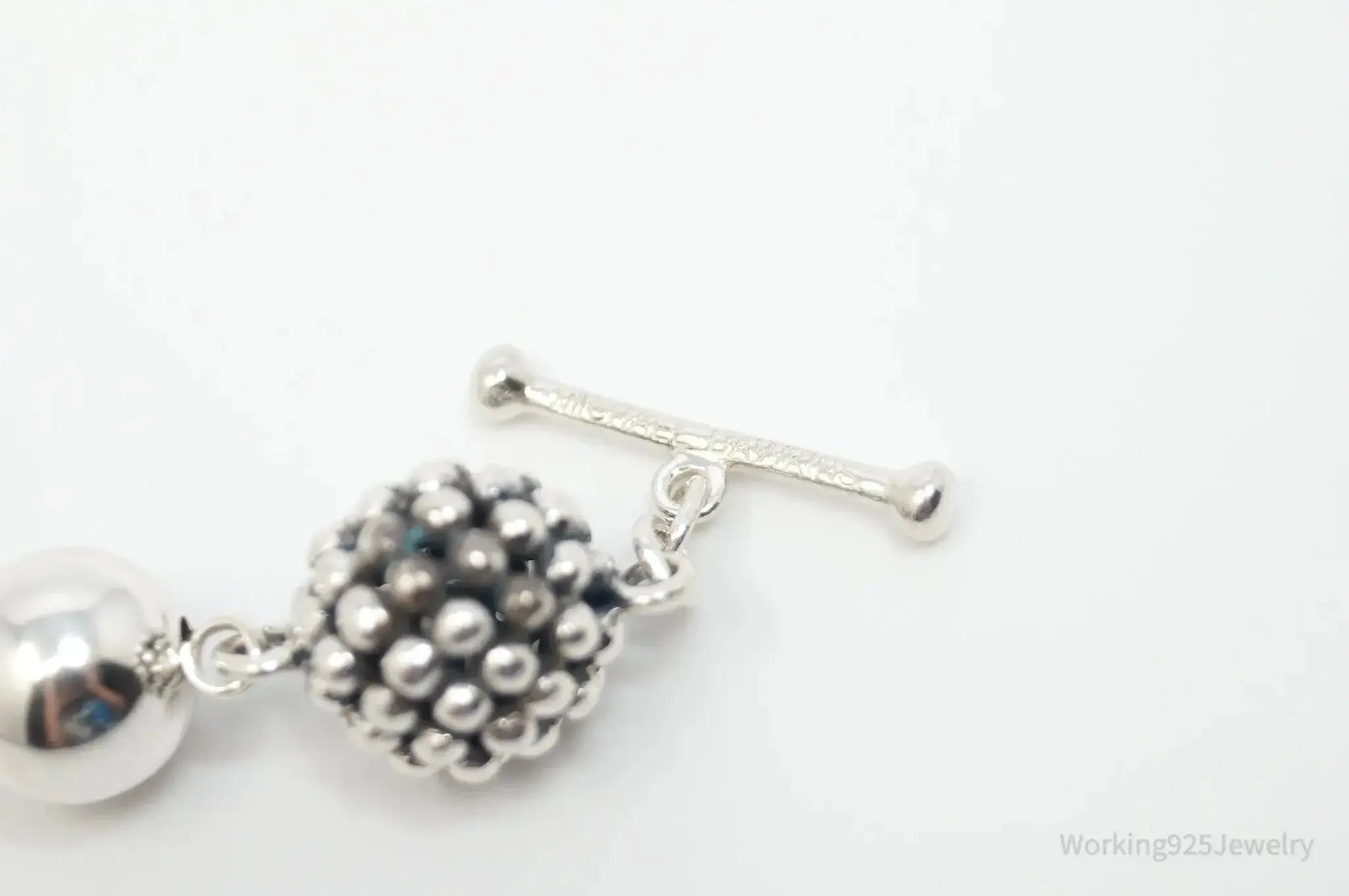 Vintage Michael Dawkins sterling silver bracelet with pearl-spotted ball design, jewelry accessory featuring elegant craftsmanship.