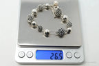 Vintage Michael Dawkins sterling silver bracelet with pearl-spotted ball design, jewelry accessory featuring intricate metalwork.