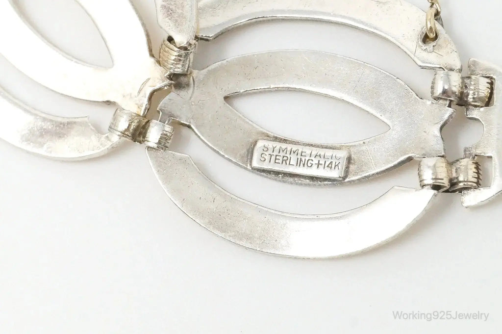 Vintage silver and 14K gold Art Deco bracelet with symmetrical design, crafted by Plush Fashion Hub.