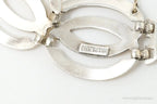 Vintage silver and 14K gold Art Deco bracelet with symmetrical design, crafted by Plush Fashion Hub.