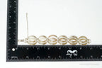 Vintage designer sterling silver bracelet with gold accents, art deco style, from Plush Fashion Hub, showcasing intricate metalwork.