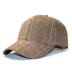 Vintage plaid baseball cap by Plush Fashion Hub featuring a classic heritage pattern, unisex adjustable hat with a vintage style.
