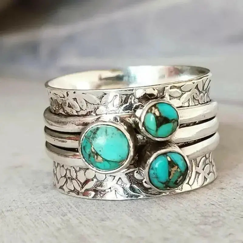 Vintage hammered boho ring with three turquoise eye accents, crafted by Plush Fashion Hub, showcasing artisanal jewelry design.