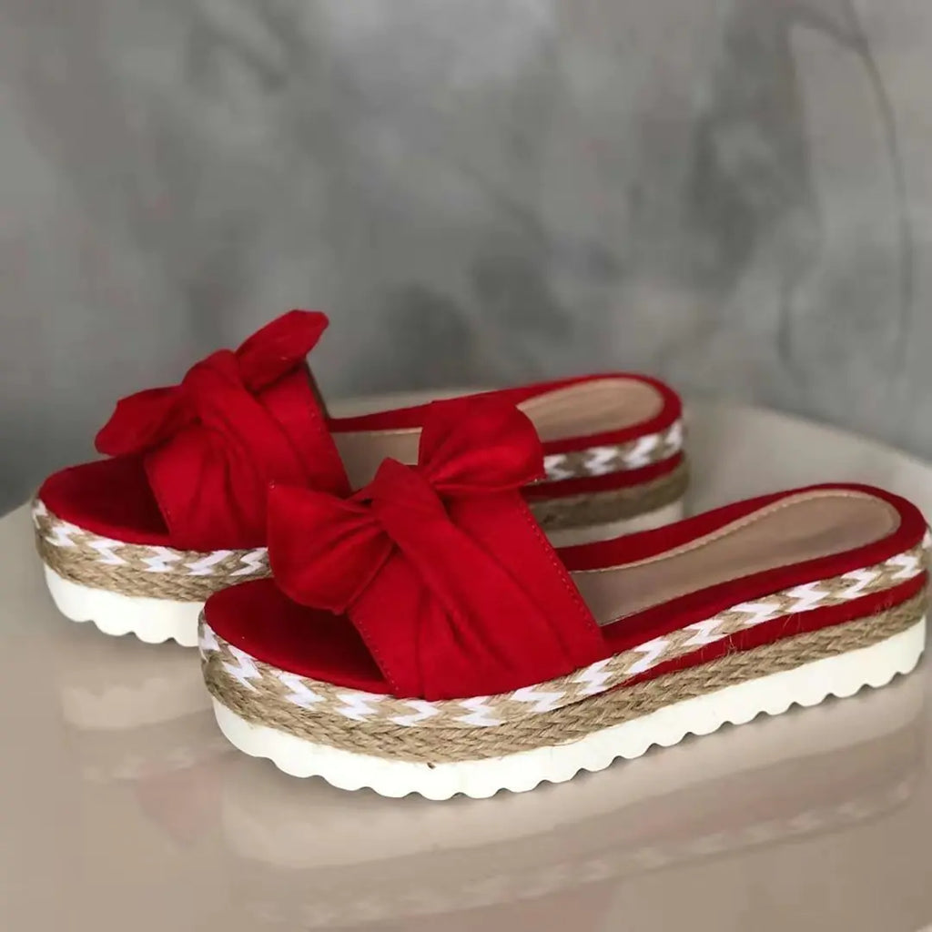 Women’s bow sandals with platform wedge heel, stylish ladies summer footwear from Trendy Attic Store01, featuring elegant bow detail.