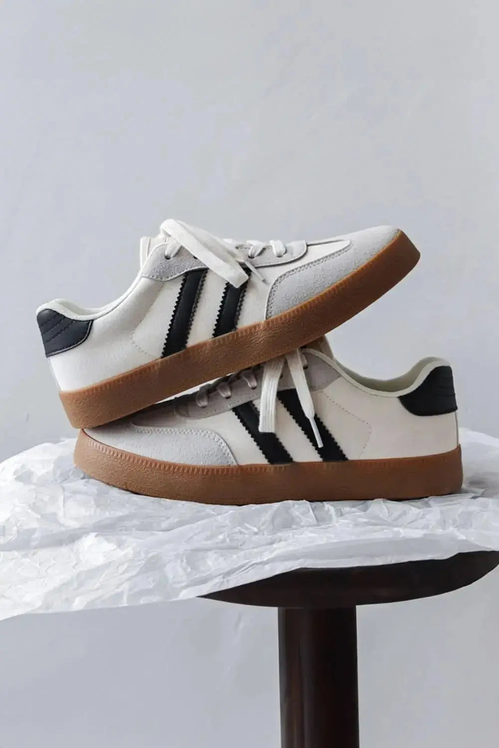 White striped women's lace-up sneakers by Gilded Glamour Shop, flat casual shoes designed for everyday comfort and style.