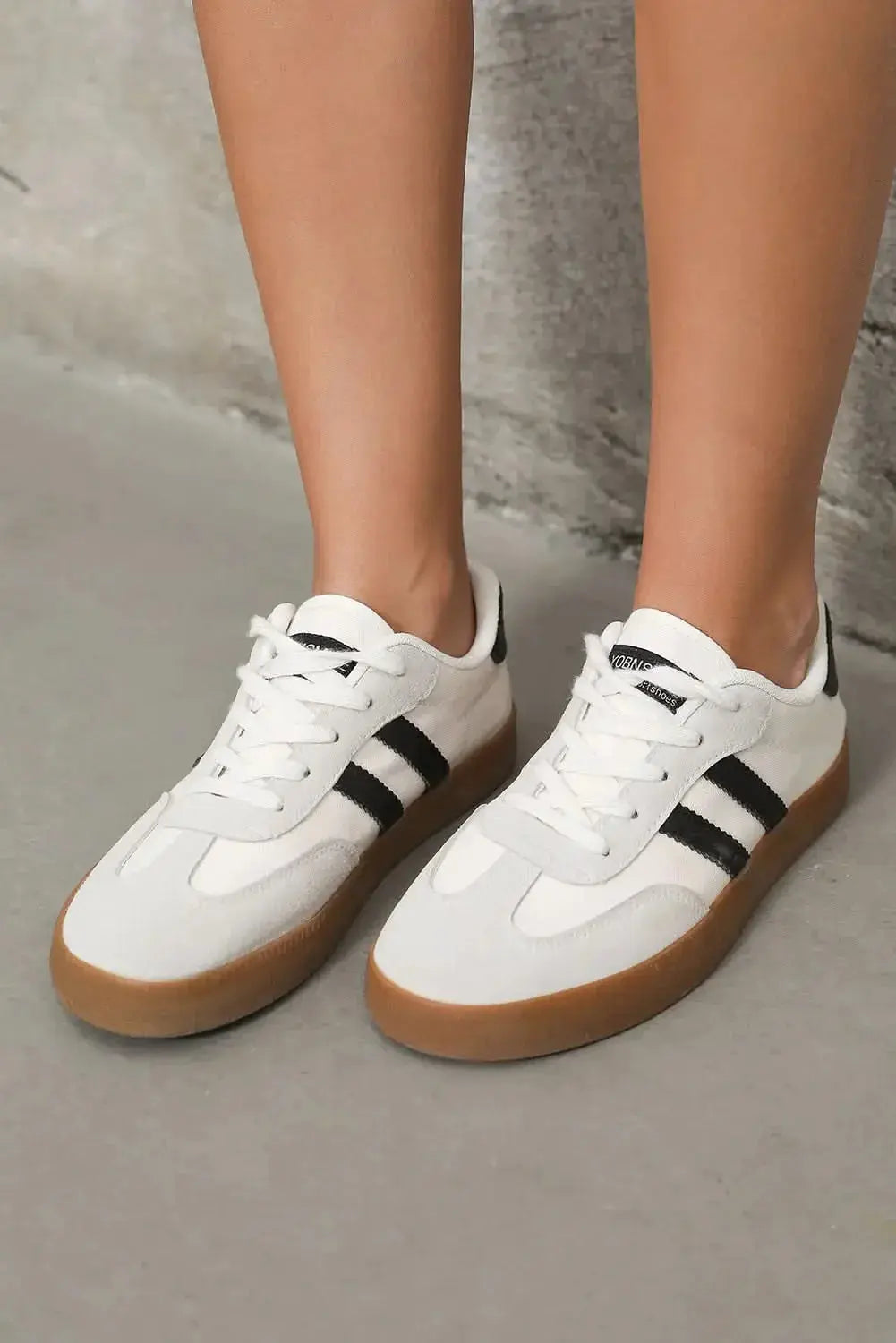 Women's white striped lace-up sneakers by Gilded Glamour Shop, casual flat shoes perfect for everyday comfort and walking.